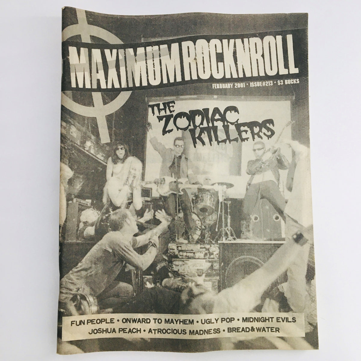 Cover of Maximum RocknRoll Magazine February 2001 #213 featuring The Zodiac Killers, showcasing punk rock culture with prominent band names and an engaging graphic design.