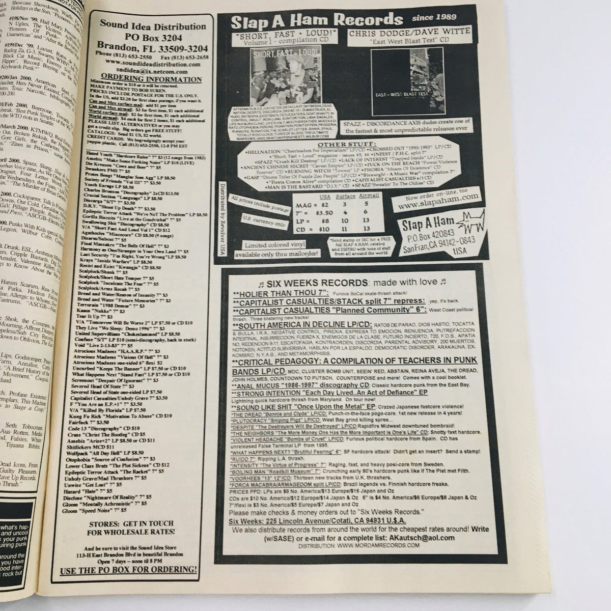 Interior page of Maximum RocknRoll Magazine February 2001 #213 displaying advertisements for punk music labels and records, reflecting the underground music scene of the early 2000s.