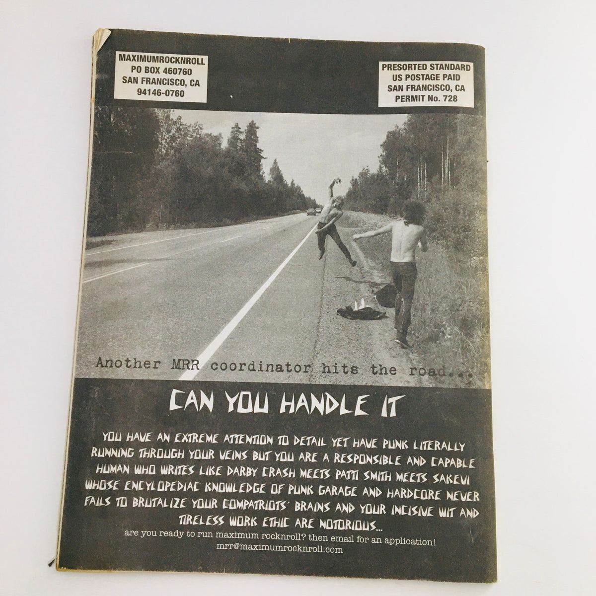 Back cover of Maximum RocknRoll Magazine February 2012 #345 featuring an illustration with a punk theme and the text 'CAN YOU HANDLE IT'.
