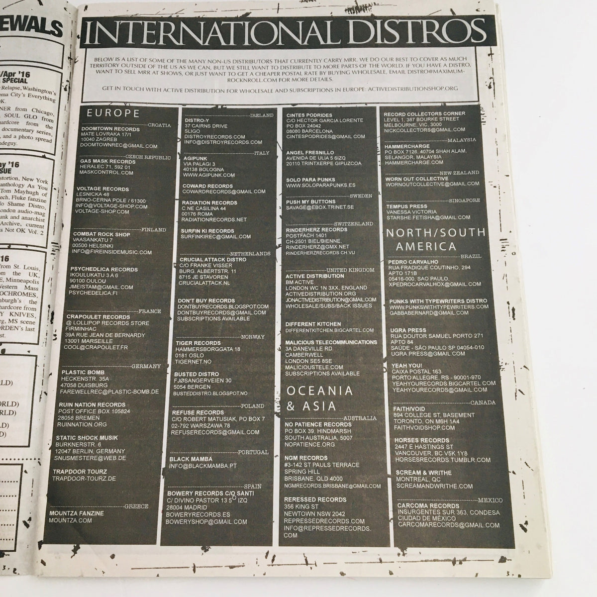Page from Maximum RocknRoll Magazine August 2016 #399 showing a list of international distributors for punk music and magazines.