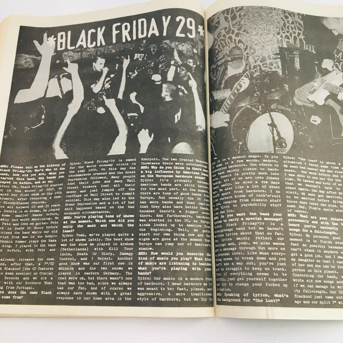 Another inside page of Maximum RocknRoll Magazine January 2004 #248 showcasing the energetic atmosphere at a live punk concert. The image captures fans and musicians during a performance highlighted in the article 'Black Friday 29'.