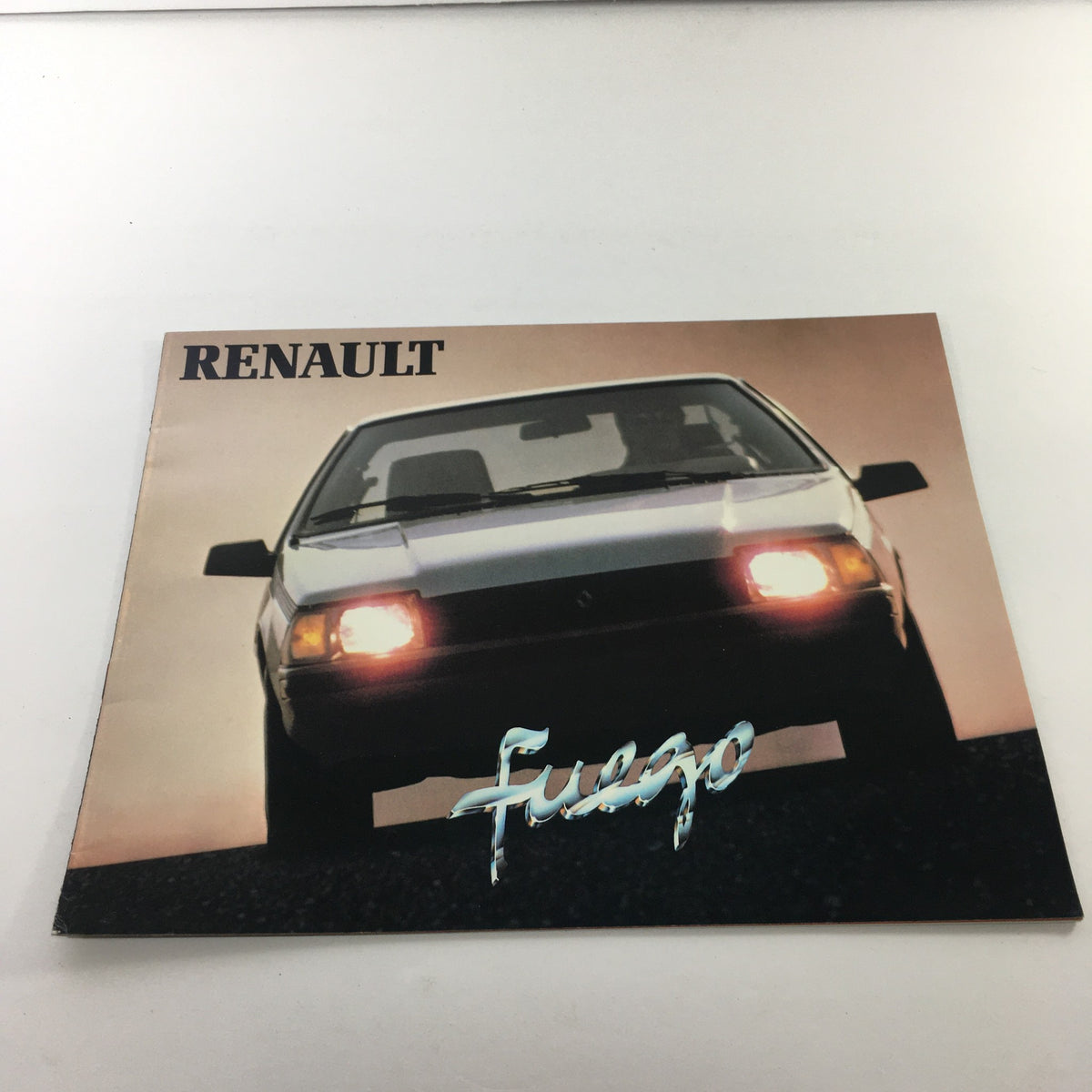 Cover of the 1984 Renault Fuego Turbo Coupe Dealership Car Auto Brochure Catalog featuring the Renault Fuego model.