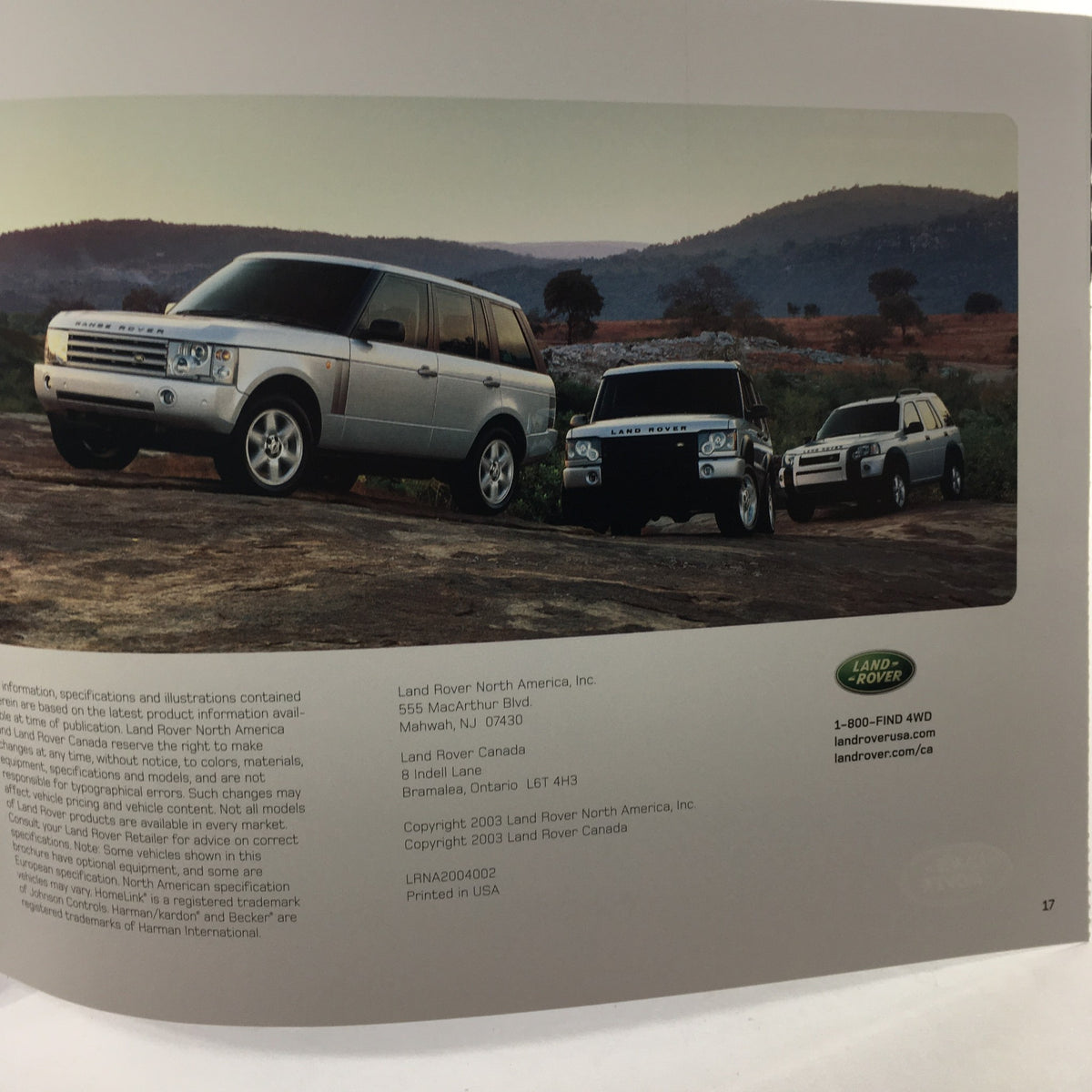 2004 Land Rover Product Guide showcasing three Land Rover vehicles on a scenic outdoor terrain, highlighting their design and performance in this dealership car auto brochure catalog.