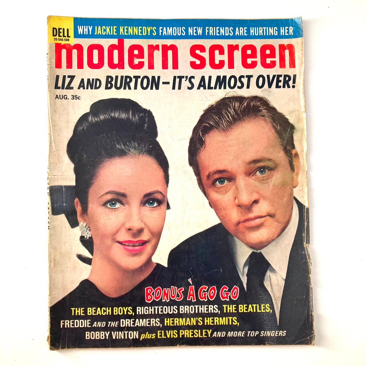 Modern Screen Magazine August 1965 featuring Elizabeth Taylor and Richard Burton on the cover, showcasing vintage Hollywood glamour and cinema history.