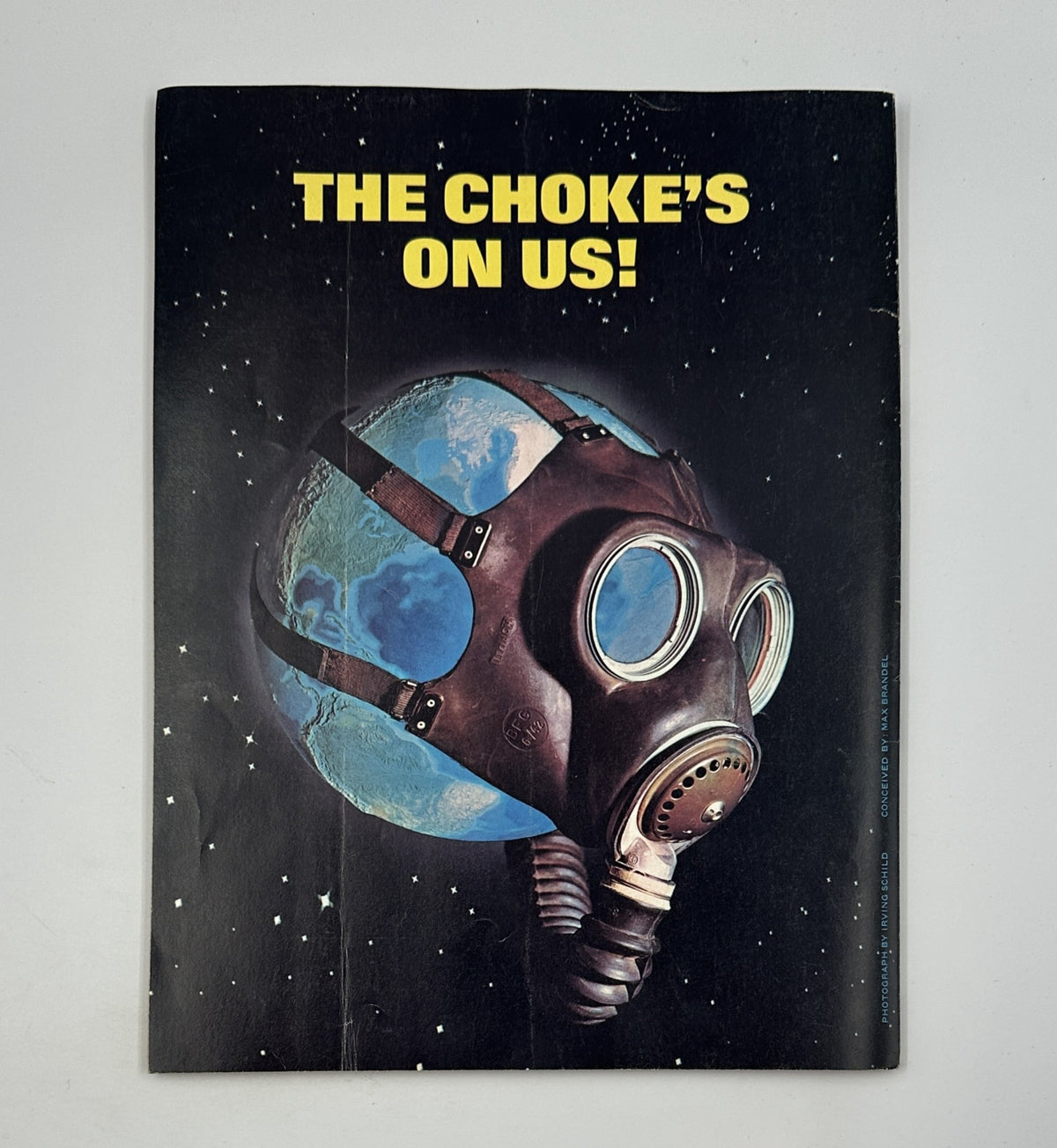 Back cover of MAD Magazine Super Special No. 21 with a strong visual featuring a gas mask against a globe, illustrating a satirical theme.
