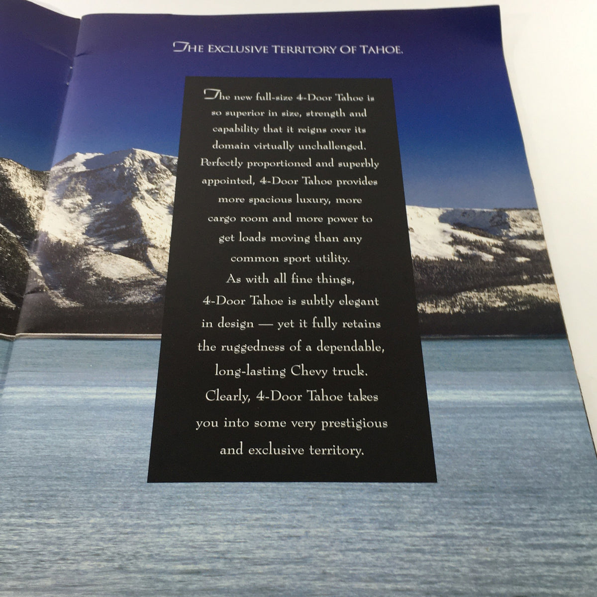 Inside view of the 1995 Chevrolet Tahoe Dealership Car Auto Brochure showcasing text about the SUV's size, strength, and luxury.
