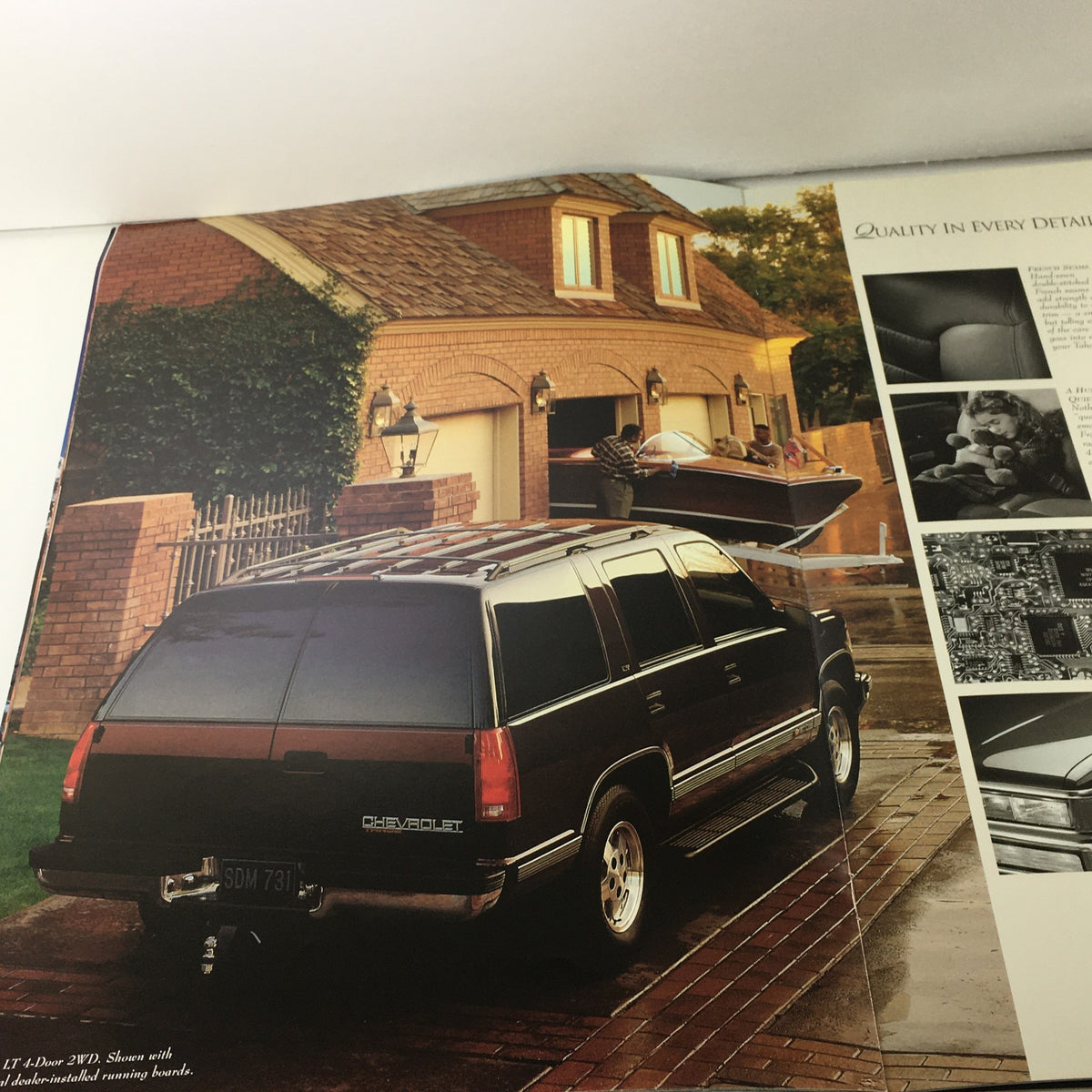 1995 Chevrolet Tahoe Dealership Car Auto Brochure Catalog featuring a black Tahoe parked in a driveway, showcasing the vehicle's design and surroundings.