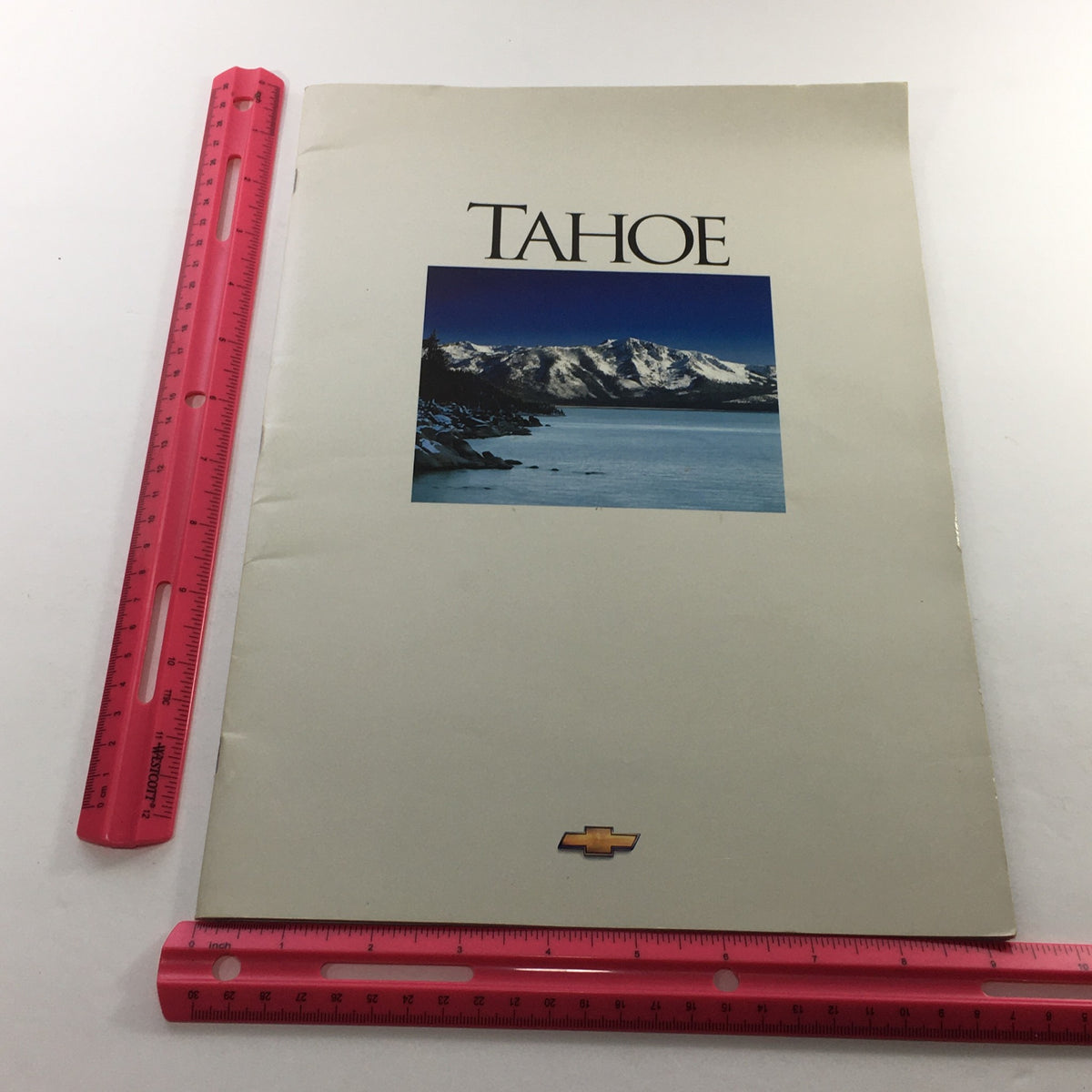Cover image of the 1995 Chevrolet Tahoe Dealership Car Auto Brochure Catalog featuring a scenic mountain lake view and the Tahoe logo.