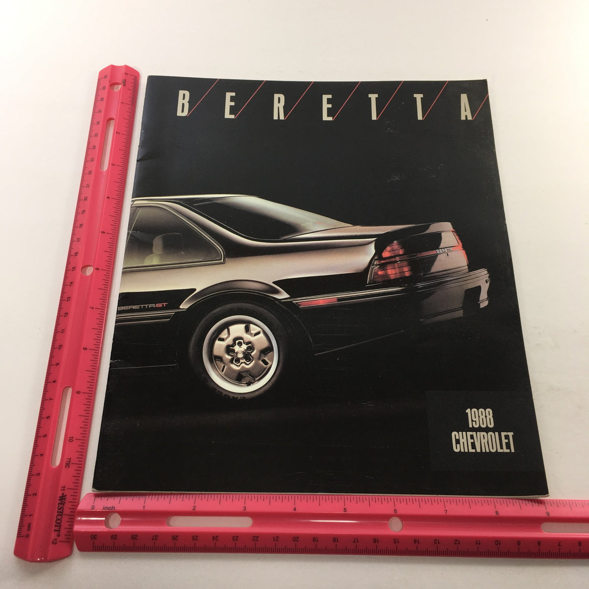 Back cover of the 1988 Chevrolet Beretta Dealership Car Auto Brochure Catalog showing the rear view of the Beretta with model information.