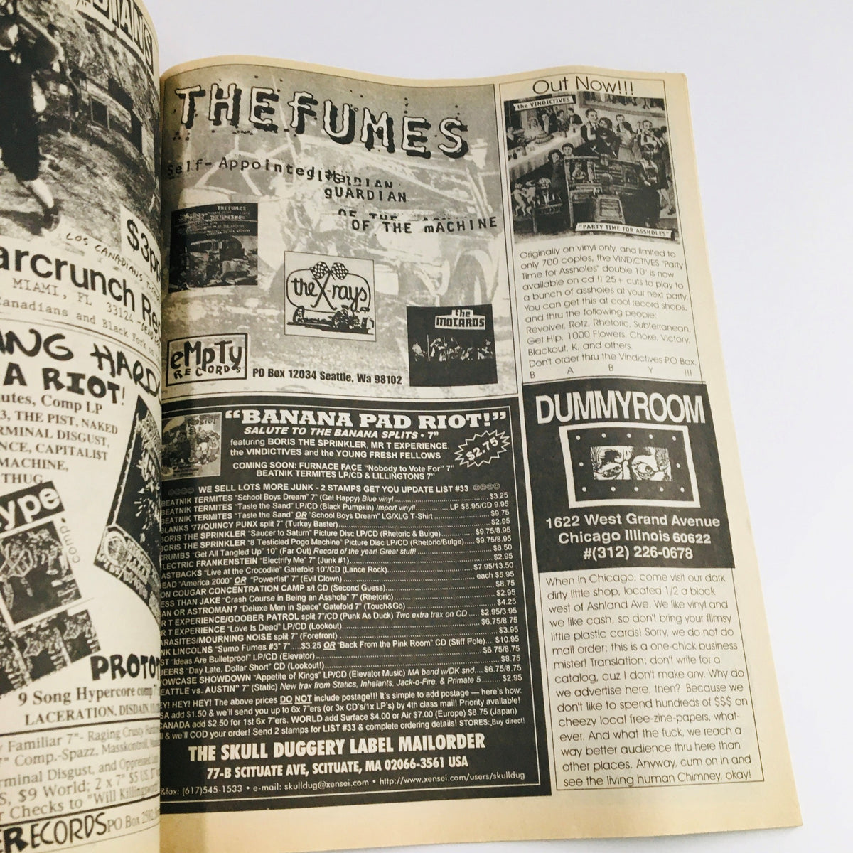 Advertisement page from Maximum RocknRoll Magazine June 1996 #157 featuring various punk and rock music related content and releases.