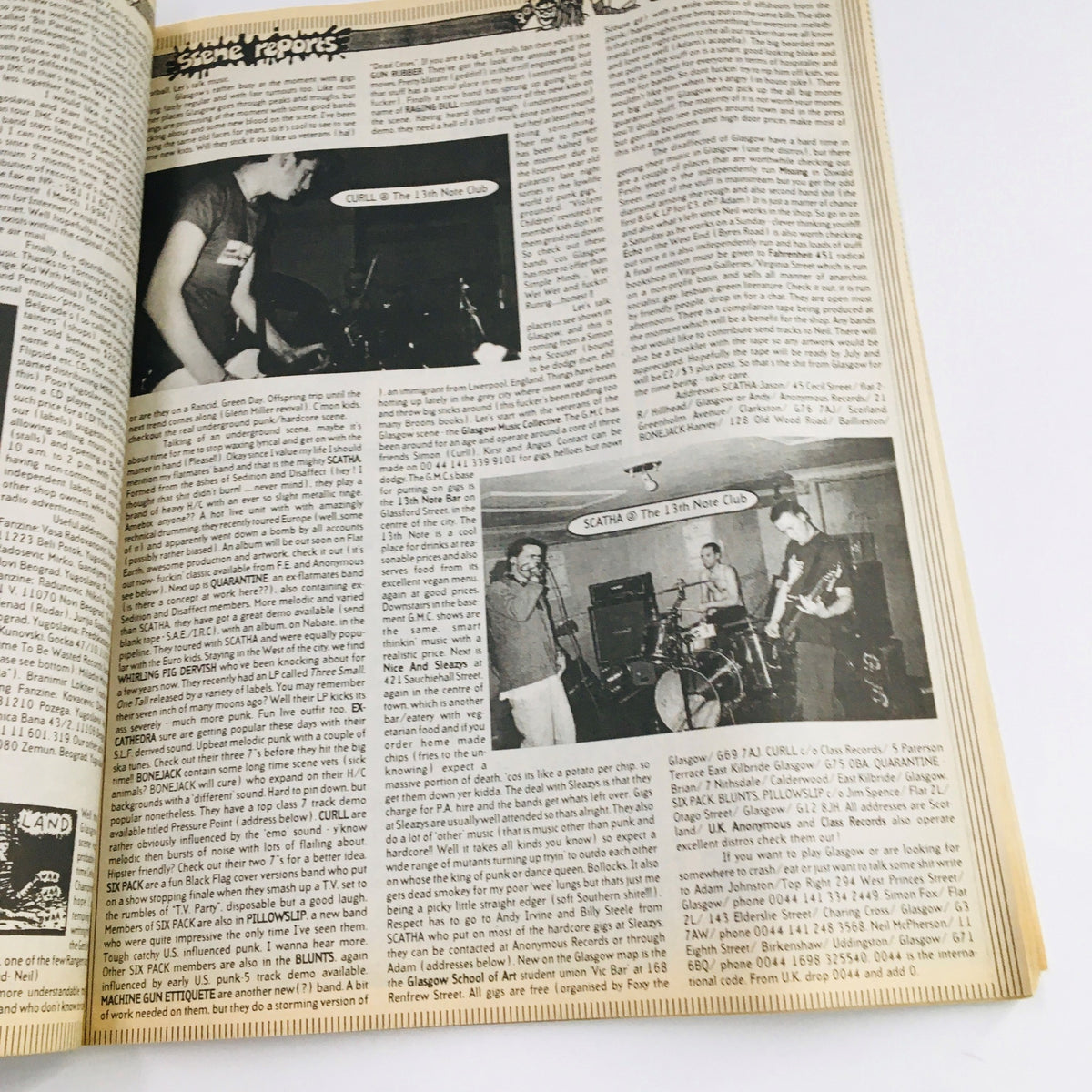 Page from Maximum RocknRoll Magazine July 1996 #158 featuring scene reports and black and white photos of punk bands performing at the 13th Note Club, illustrating the vibrant punk culture of the 1990s.
