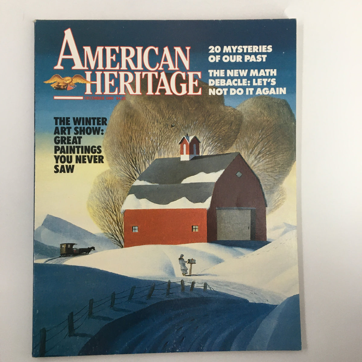 Cover of American Heritage Magazine December 1990 featuring 'The Winter Art Show' with a snow-covered barn and a painter in winter attire, showcasing historical art and culture.