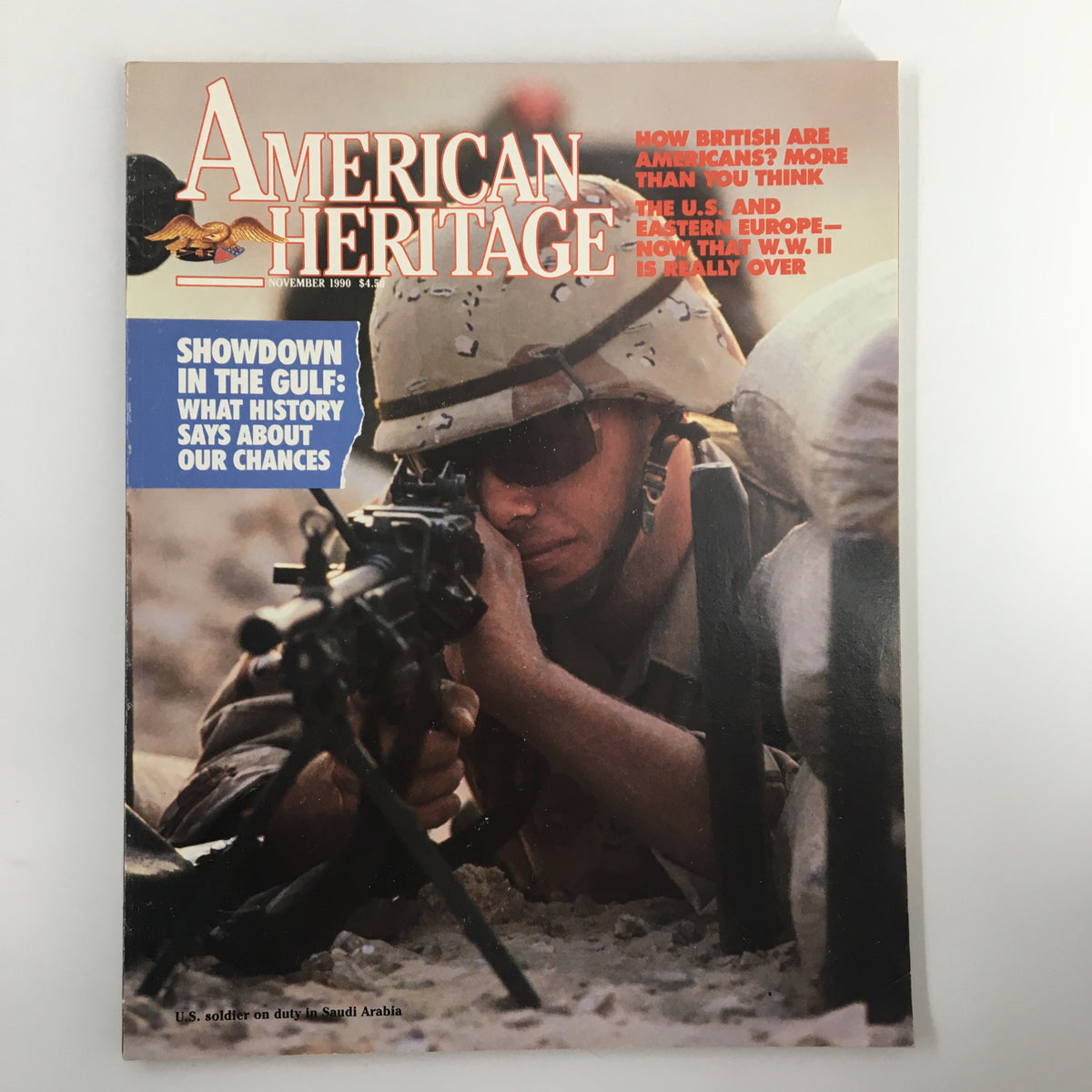 Cover of American Heritage Magazine November 1990, featuring a soldier aiming a weapon in a desert setting, highlighting articles on U.S. and Eastern Europe.