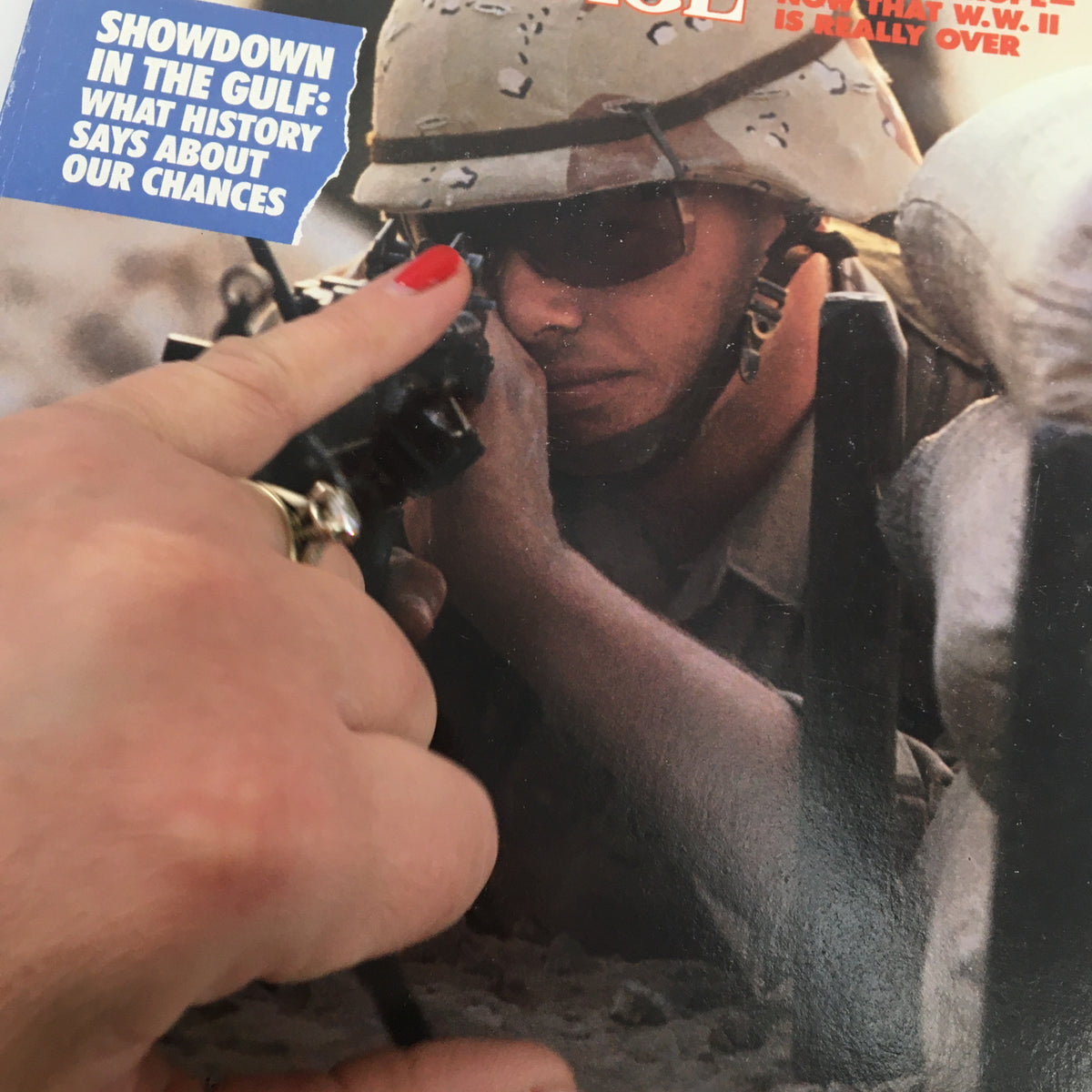 Close-up of the cover of American Heritage Magazine November 1990, showing a soldier's intense focus while aiming, with the title and article highlights visible.