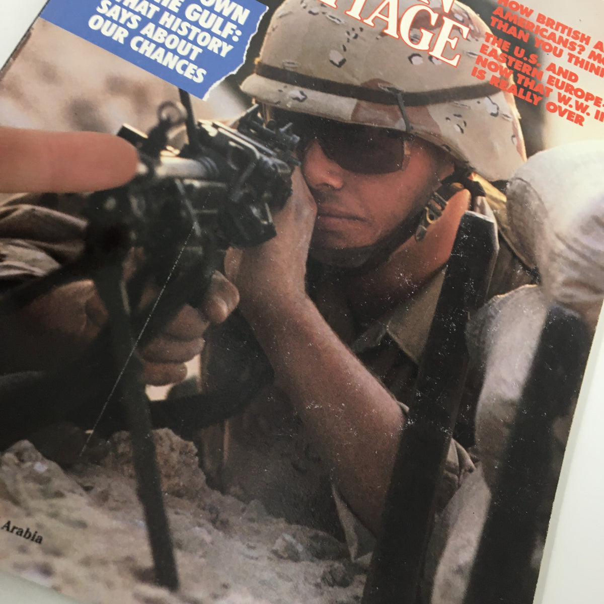Close-up of the American Heritage Magazine November 1990 cover, showing a soldier in combat gear aiming a weapon, emphasizing military history and the Gulf conflict.