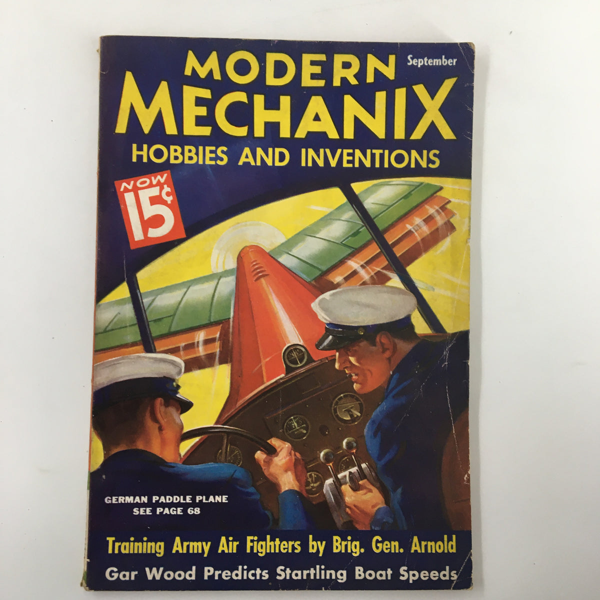 Cover of VTG Modern Mechanix Magazine from September 1936 featuring the German Paddle Plane, highlighting articles on hobbies and inventions, with an illustration of two men in uniforms in a cockpit.