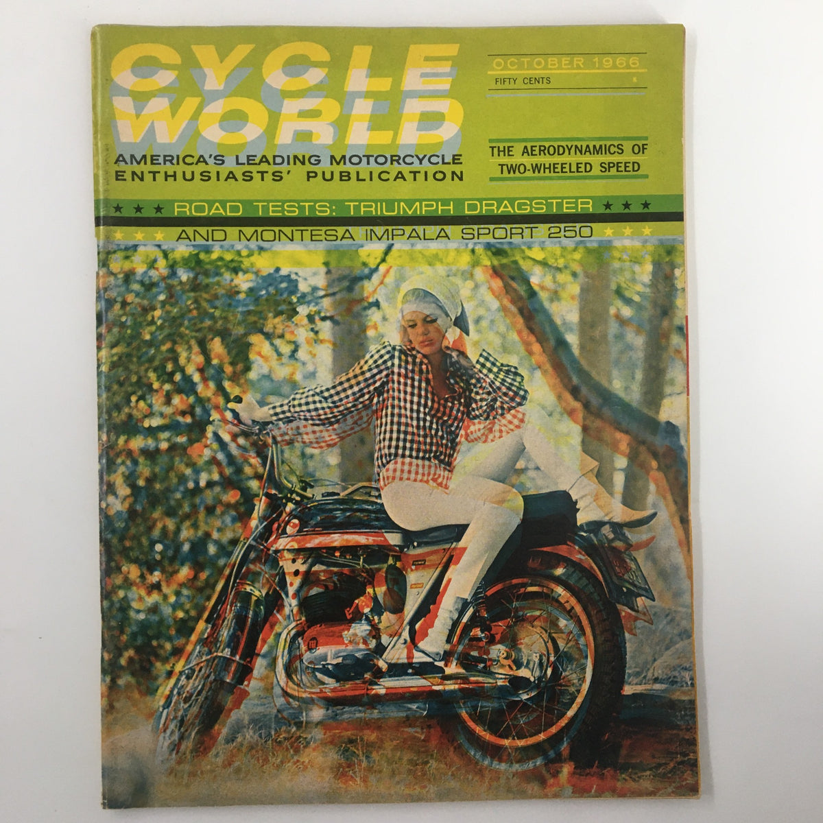 Cover of VTG Cycle World Magazine October 1966 featuring the Triumph Dragster and Montesa Impala, showcasing a model posing on a motorcycle in a forested setting.