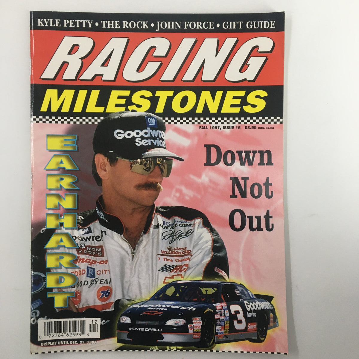 Cover of Racing Milestones Magazine Fall 1997 featuring Dale Earnhardt, showcasing his iconic look and a title highlighting his story 'Down Not Out'.