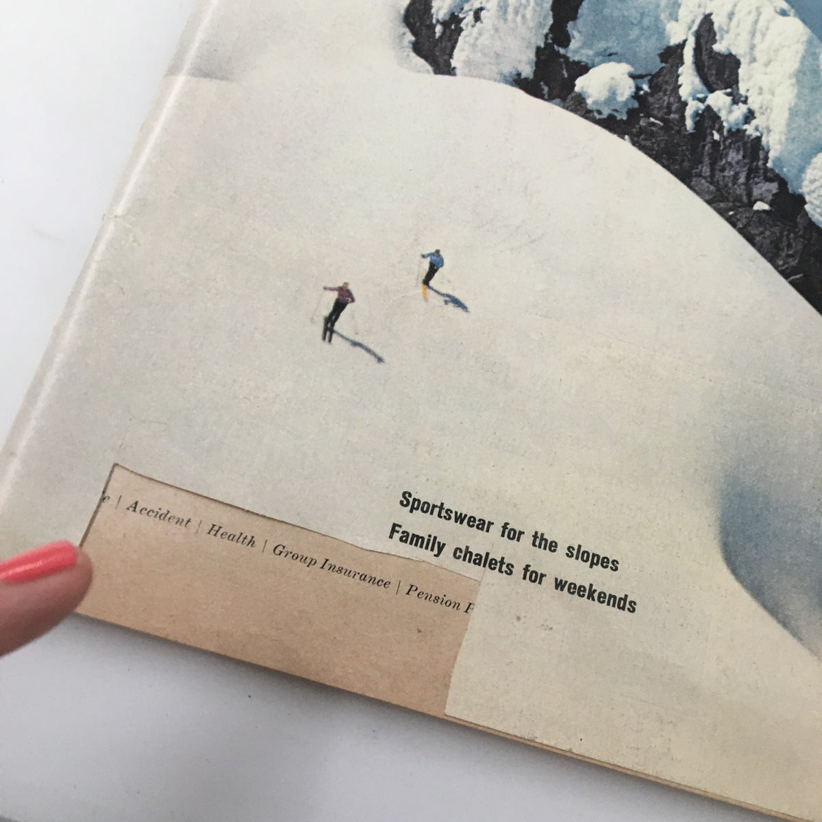 Close-up of the back cover of the VTG Sports Illustrated Magazine from November 21, 1960, showing the text 'Sportswear for the Slopes' and additional promotional information.