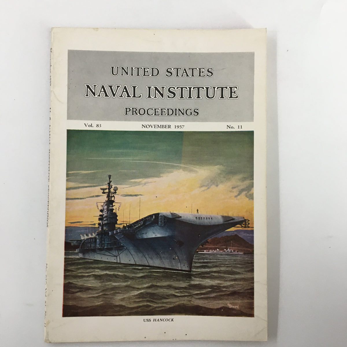 Cover of VTG United States Naval Institute Proceedings November 1957 featuring the USS Hancock, showcasing naval history and artwork.