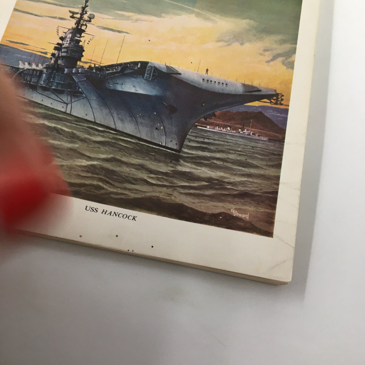 Close-up view of the cover of VTG United States Naval Institute Proceedings November 1957, highlighting the USS Hancock and artistic details.