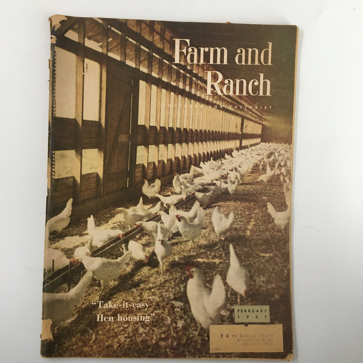 Cover of the February 1957 issue of Farm and Ranch Magazine featuring the article 'Take-It-Easy Hen Housing' with a photo of chickens in a barn setting.