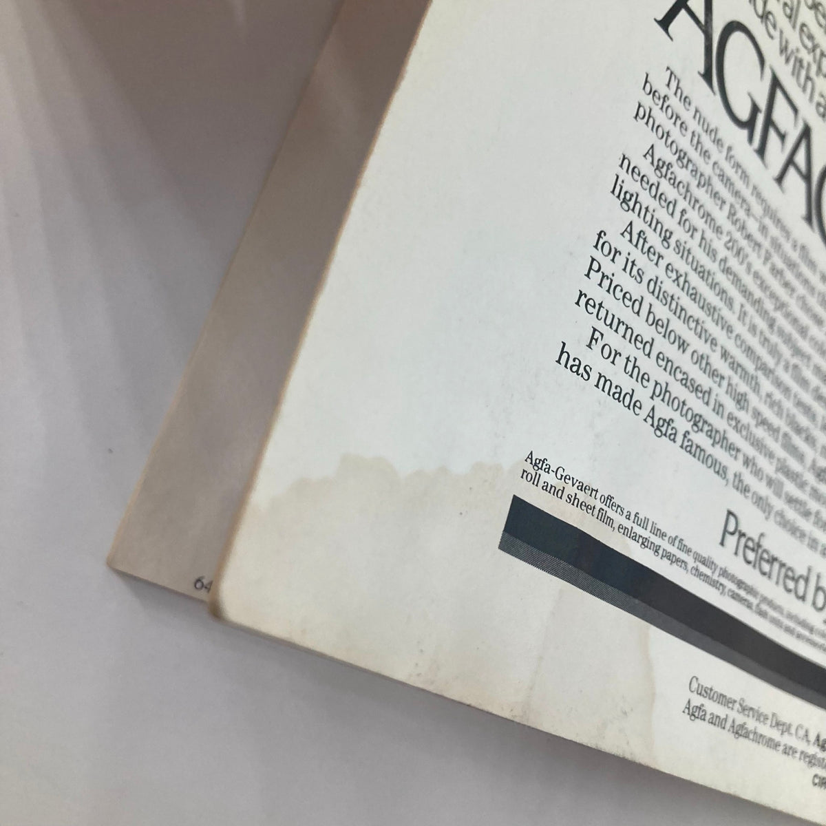 Close-up detail of the back cover of the July 1983 Camera Arts Magazine, highlighting a promotional section for AGFACHROME 200 film with visual examples, related to 'VTG Camera Arts Magazine July 1983 Hamiet Blueitt 1980 by Anthony Barboza'.