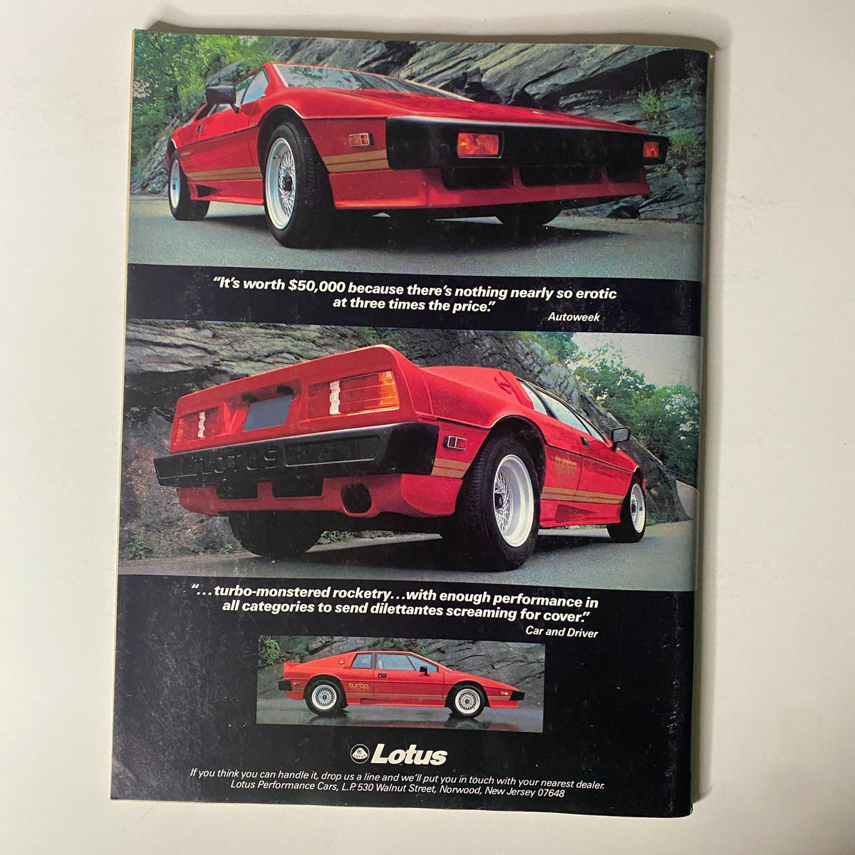 Back cover of Forbes Magazine April 8, 1985 featuring a vibrant red Lotus car advertisement with quotes about its performance and design.