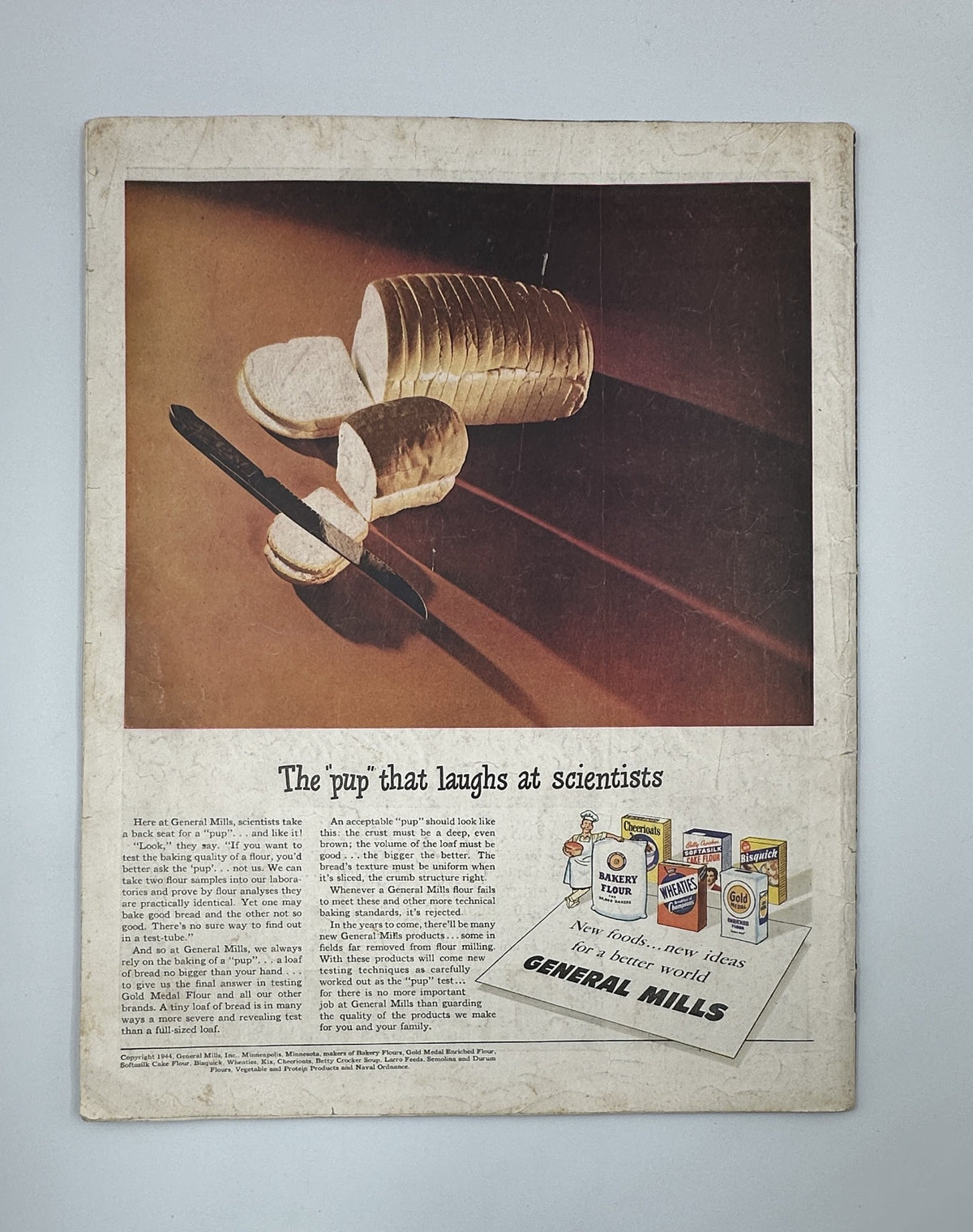 Back cover of the Saturday Evening Post Magazine from October 21, 1944, featuring an advertisement for General Mills. The ad displays a sleek design with a humorous tagline about a 'pup' that laughs at scientists.