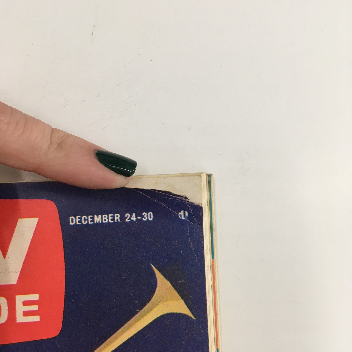 Close-up of the cover of TV Guide Magazine December 24 1966 highlighting the publication date and festive design.