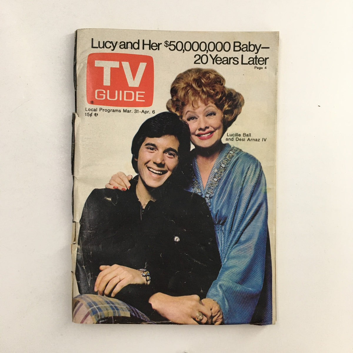 TV Guide Magazine March 31 1973 cover featuring Lucille Ball and Desi Arnaz IV. The cover highlights their reunion, with a colorful design and bold text, ideal for vintage TV memorabilia.