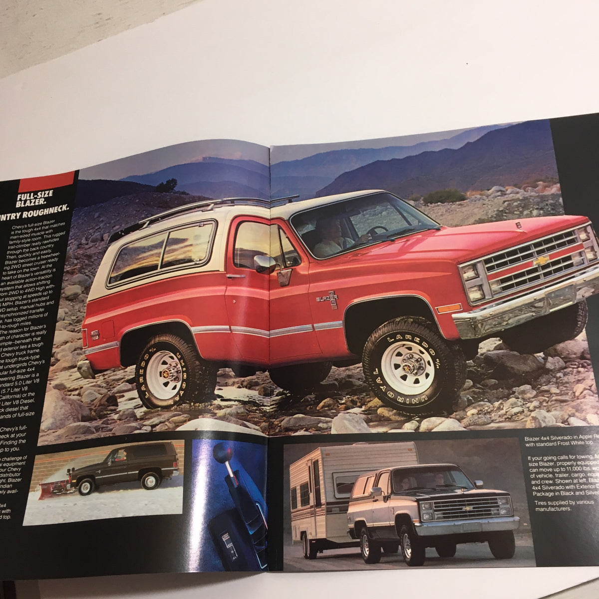 Inside view of the 1985 Chevy Trucks Full-Size Blazer brochure displaying red Blazer's specifications and features.