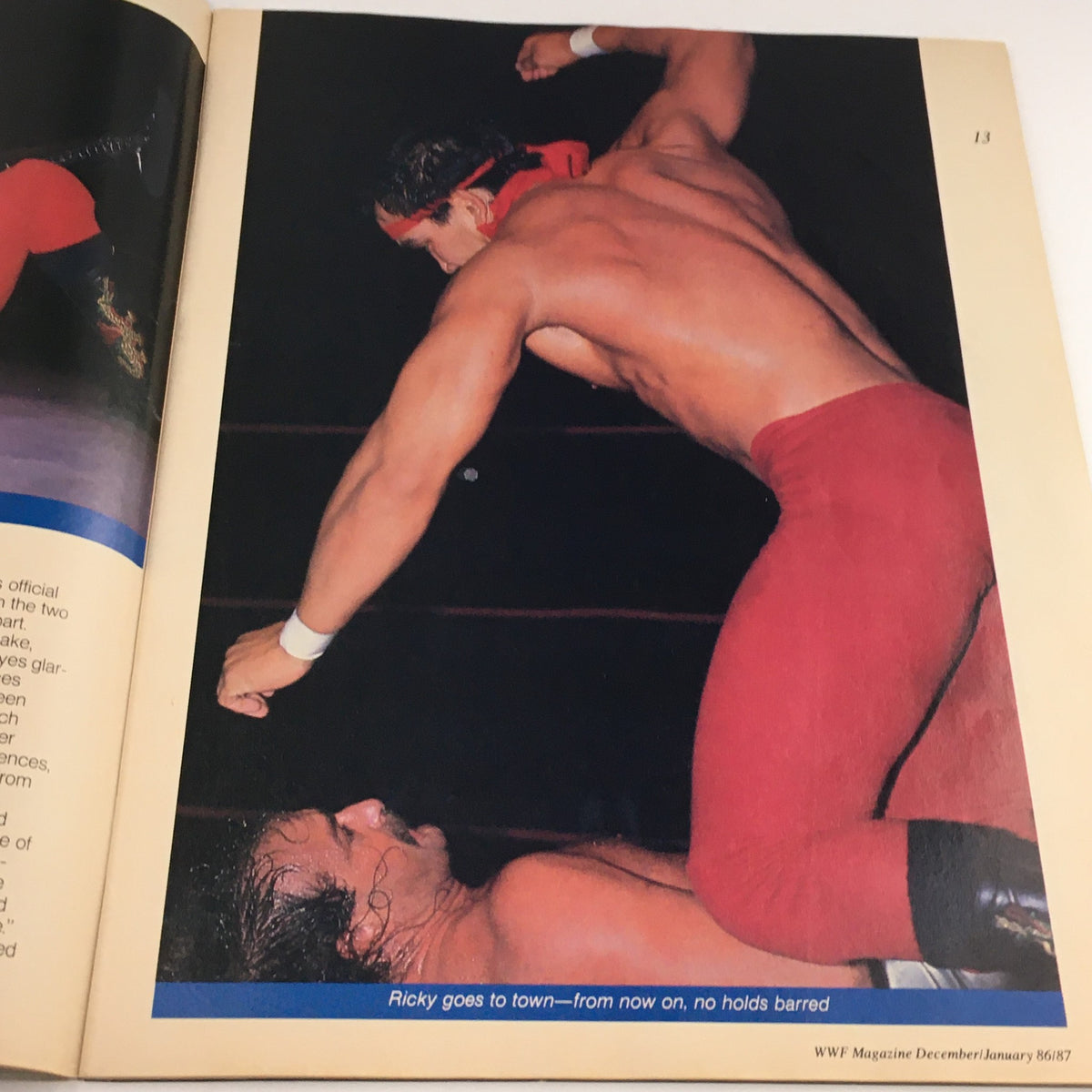 WWF Magazine December 1986 image of a wrestling match featuring a wrestler executing a move in the ring, showcasing the vibrant action typical of professional wrestling.