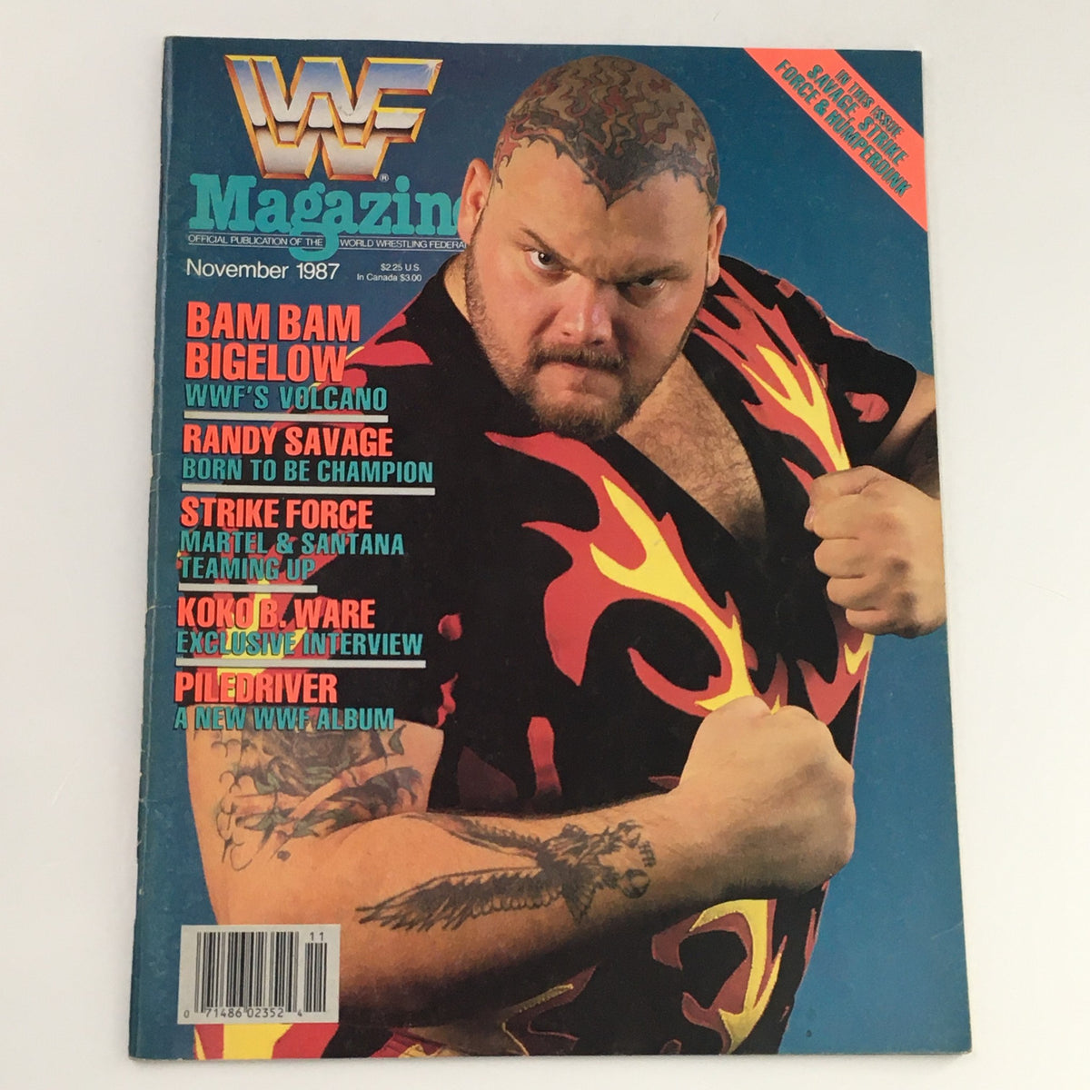 WWF Magazine November 1987 featuring Bam Bam Bigelow on the cover, showcasing vibrant wrestling graphics and headlines about wrestling superstars.