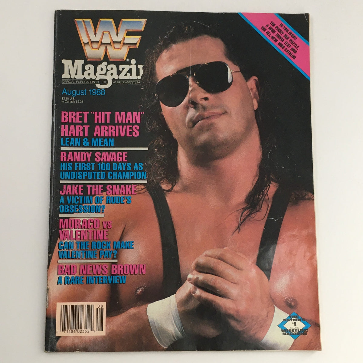 WWF Magazine August 1988 featuring Bret 'Hit Man' Hart on the cover, showcasing wrestling icons with headlines about Randy Savage and Jake The Snake, vintage wrestling collectible.