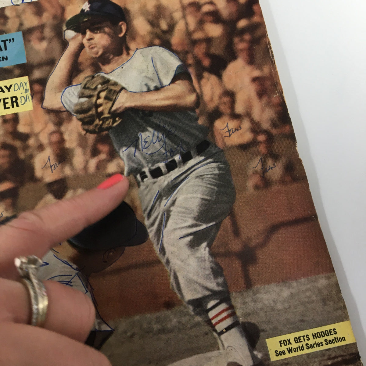 Detailed view of a vintage baseball player in action on the cover of the VTG Dell Sports Magazine Baseball from April 1960, underlining the historical significance of the publication.