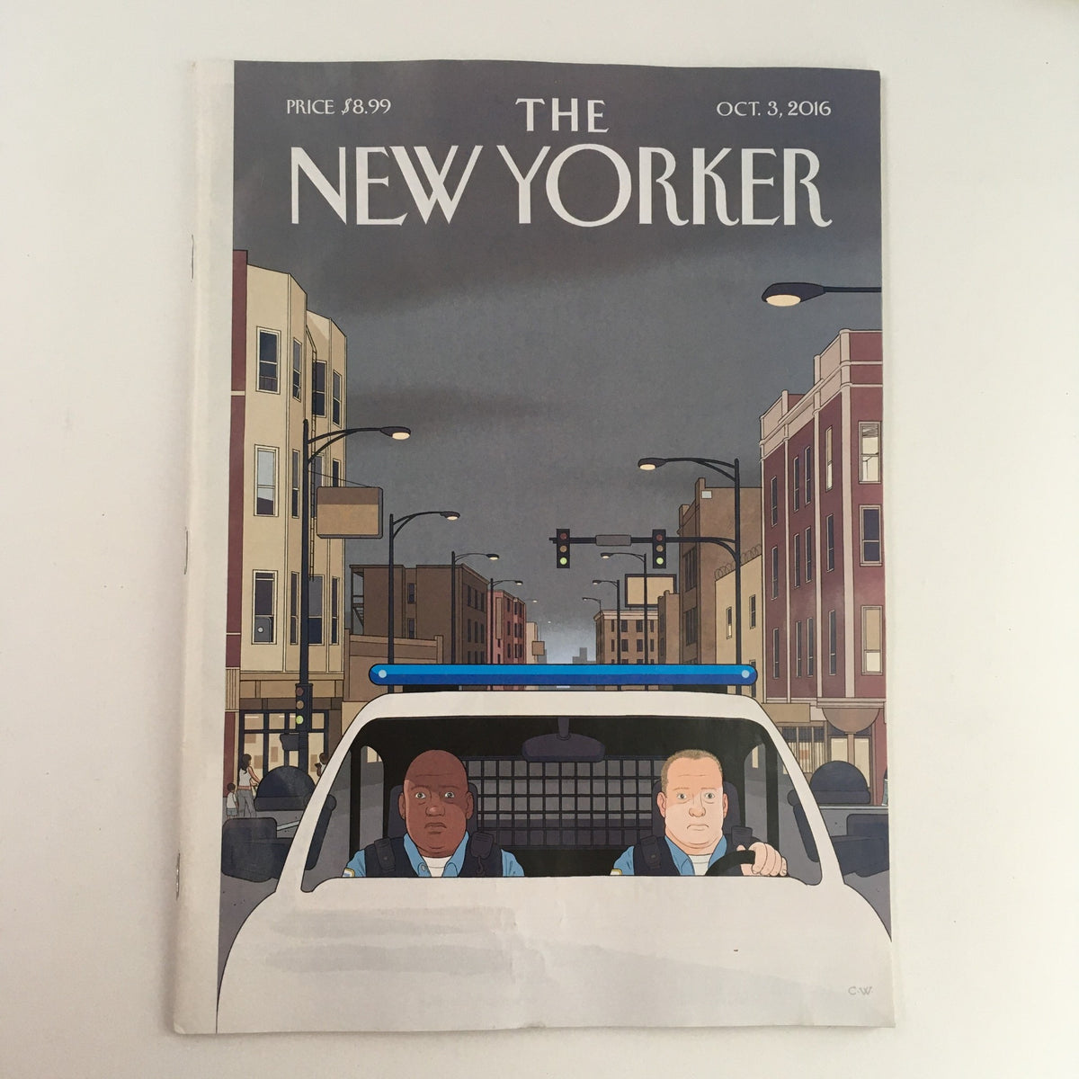 Cover of The New Yorker October 3 2016 showcasing a thematic illustration titled 'Shift' by Chris Ware, featuring two characters in a police vehicle with a cityscape background.
