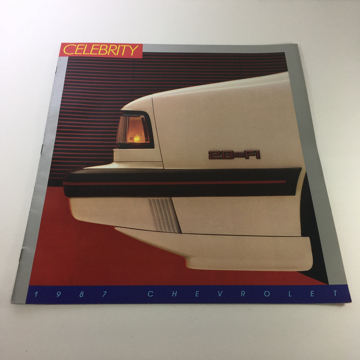 1987 Chevrolet Celebrity Dealership Brochure illustrating the back view design elements of the vehicle.