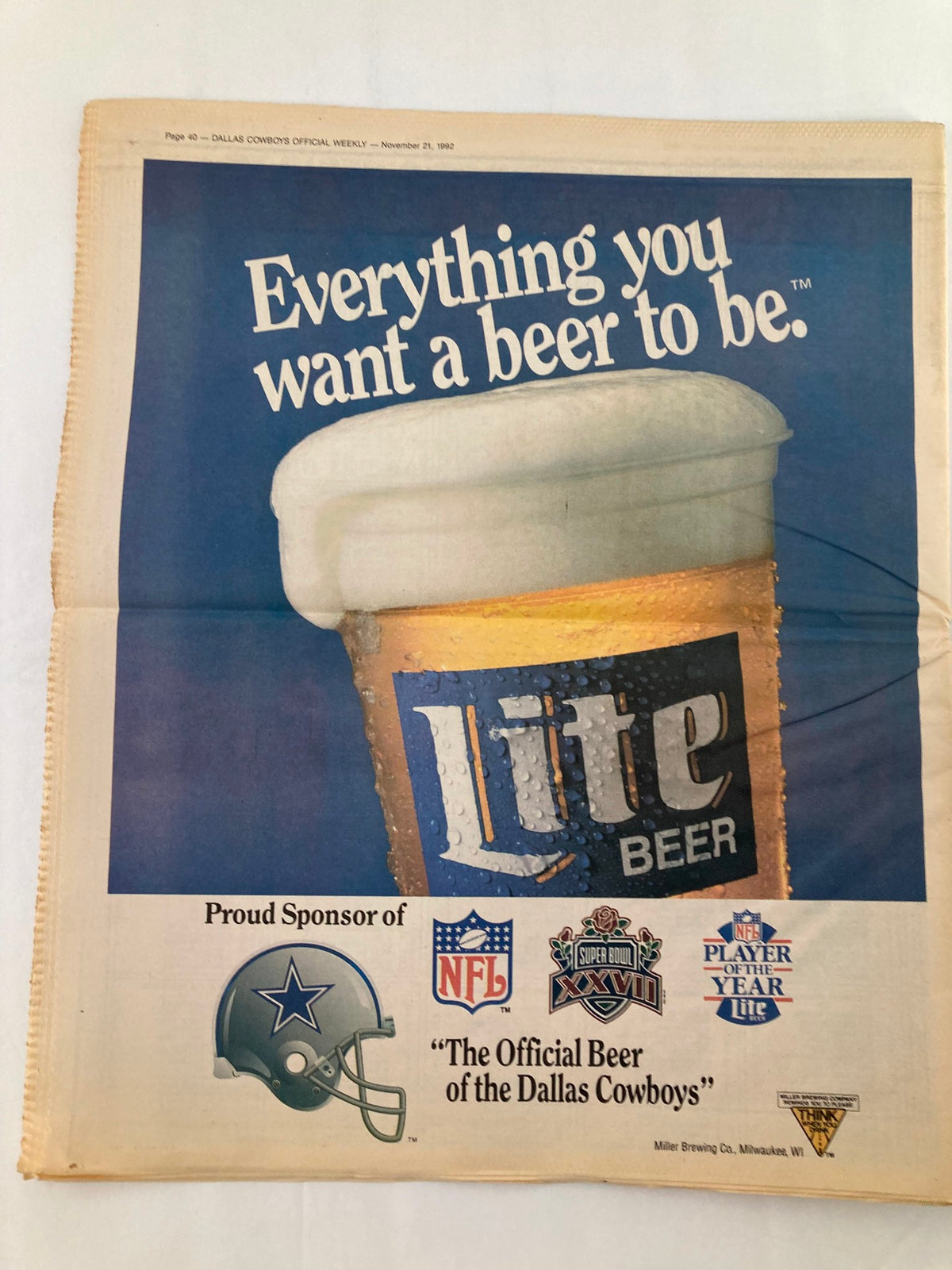 Back page of Dallas Cowboys Weekly Newspaper November 21 1992 showcasing a Lite Beer advertisement, promoting it as 'The Official Beer of the Dallas Cowboys'.