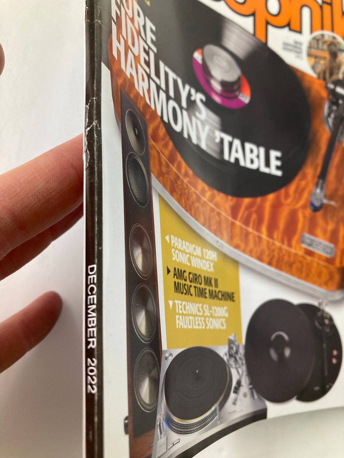 Close-up of the spine of Stereophile Magazine December 2022, highlighting the publication date and minor wear, part of the high-fidelity audio edition.