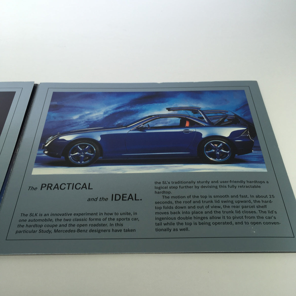 Interior page from the 1994 Mercedes-Benz SLK Design Studies brochure showcasing the retractable hardtop feature with a blue sports car.