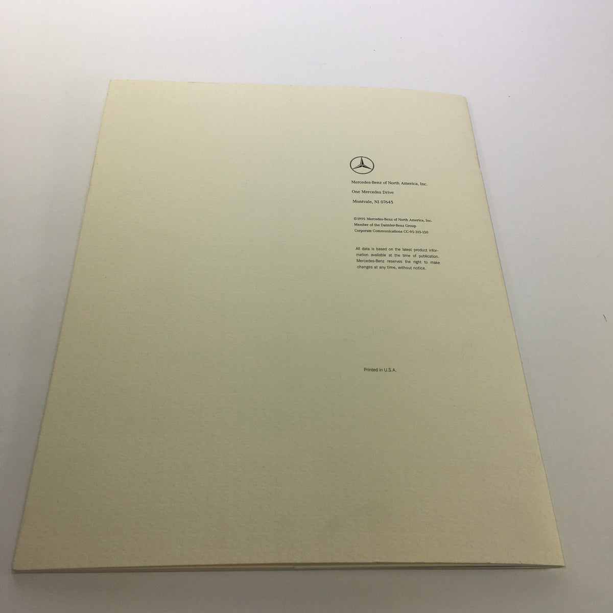 Back cover of the 1995 Mercedes-Benz C-Class Information Dealership Car Auto Brochure Catalog featuring the Mercedes-Benz logo and contact information.