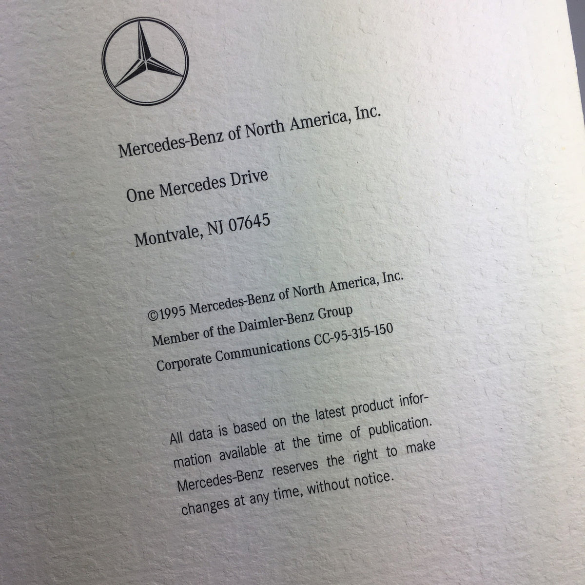 Close-up of the inside back cover from the 1995 Mercedes-Benz C-Class Information Dealership Car Auto Brochure Catalog showing corporate details and membership information.