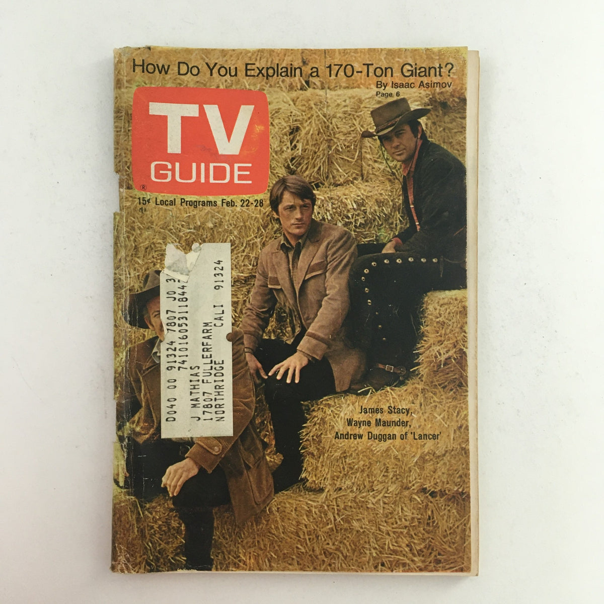 TV Guide cover from February 22, 1969, featuring Andrew Duggan and James Stacy, highlighting the article 'How Do You Explain a 170-Ton Giant?' alongside details of local programs.