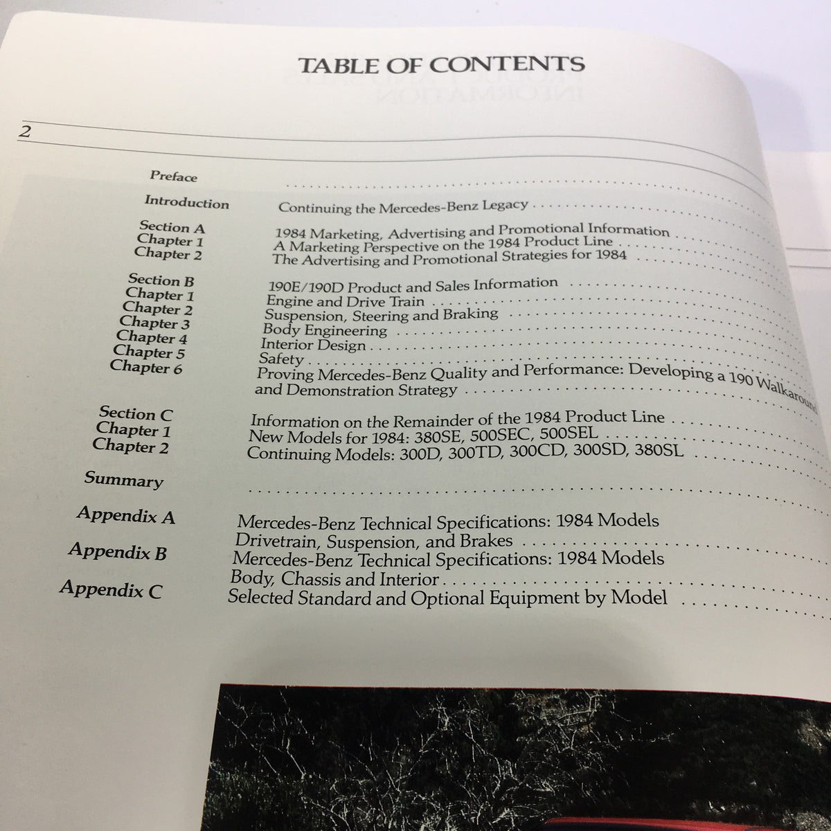 Table of contents from the 1984 Mercedes-Benz 190-Class Product and Sales Information Catalog, outlining major sections and chapters.