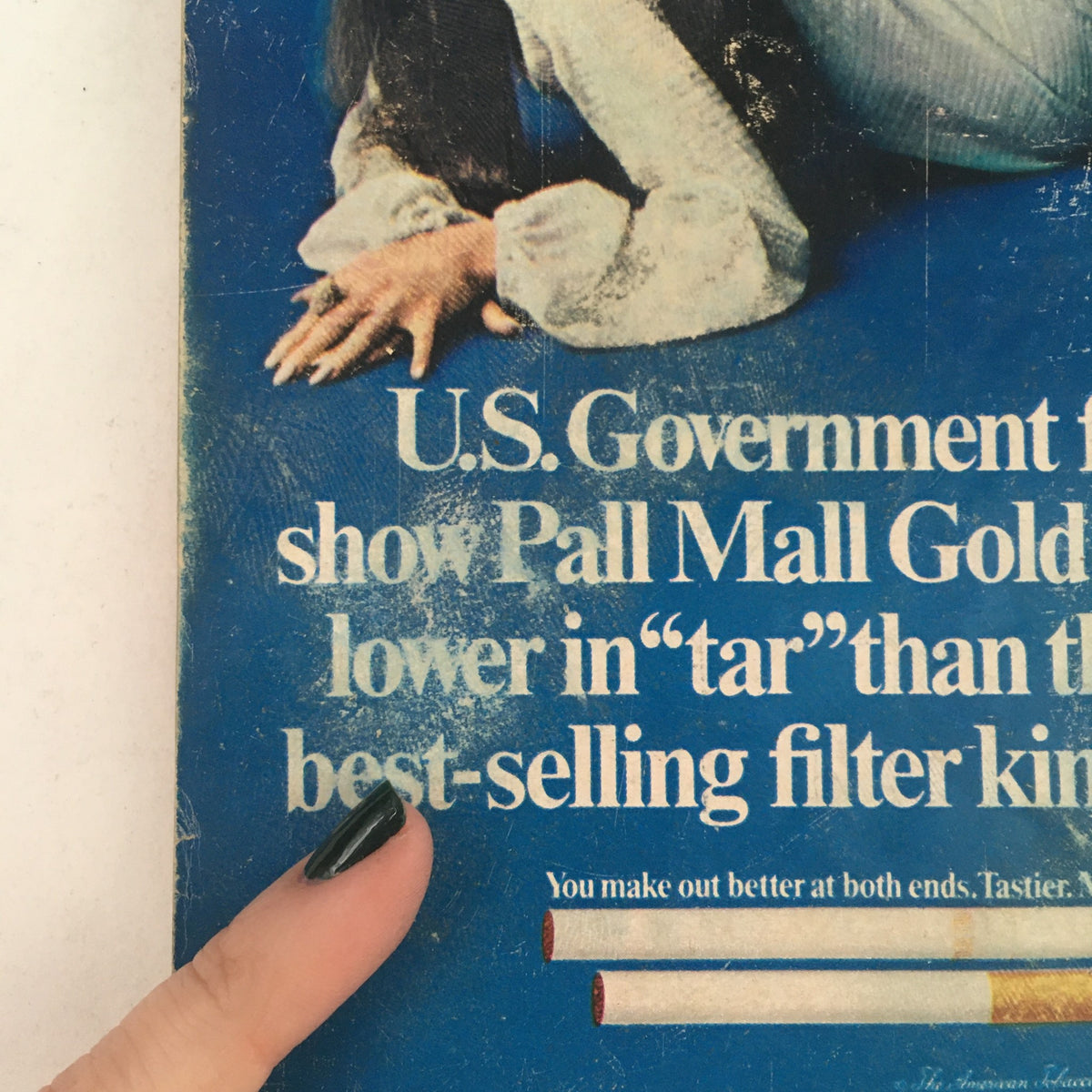 Close-up of text from TV Guide May 24 1969 featuring U.S. Government statement on Pall Mall Gold cigarettes, showcasing historical advertising from the 1960s.