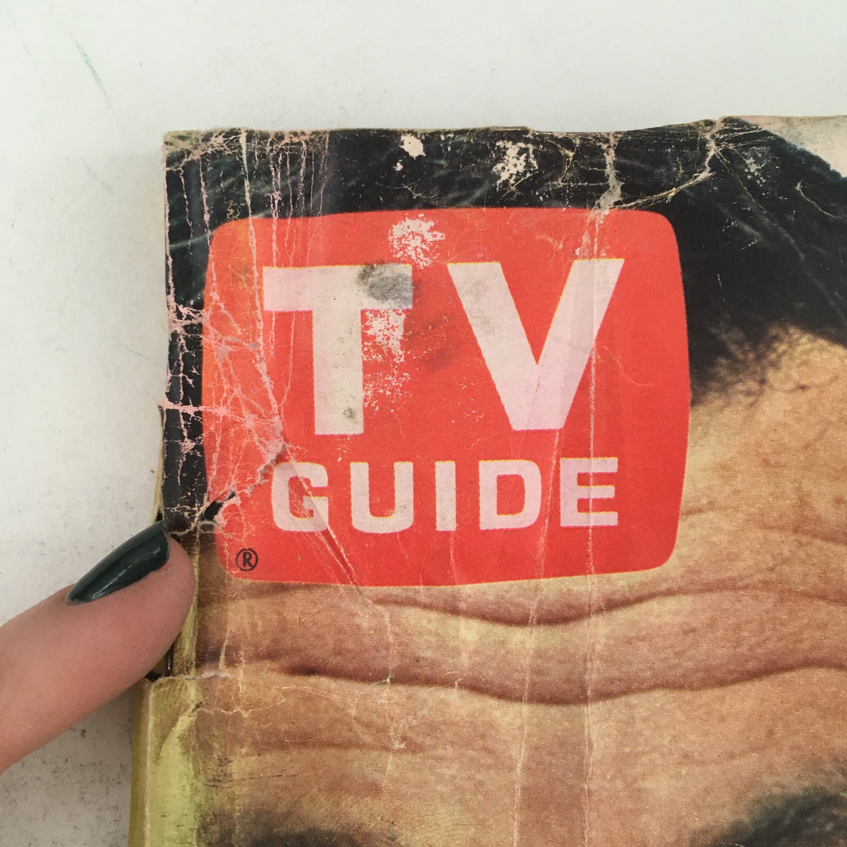 Close-up of the TV Guide logo on the cover of the October 14 1967 issue, highlighting its vintage condition and wear.