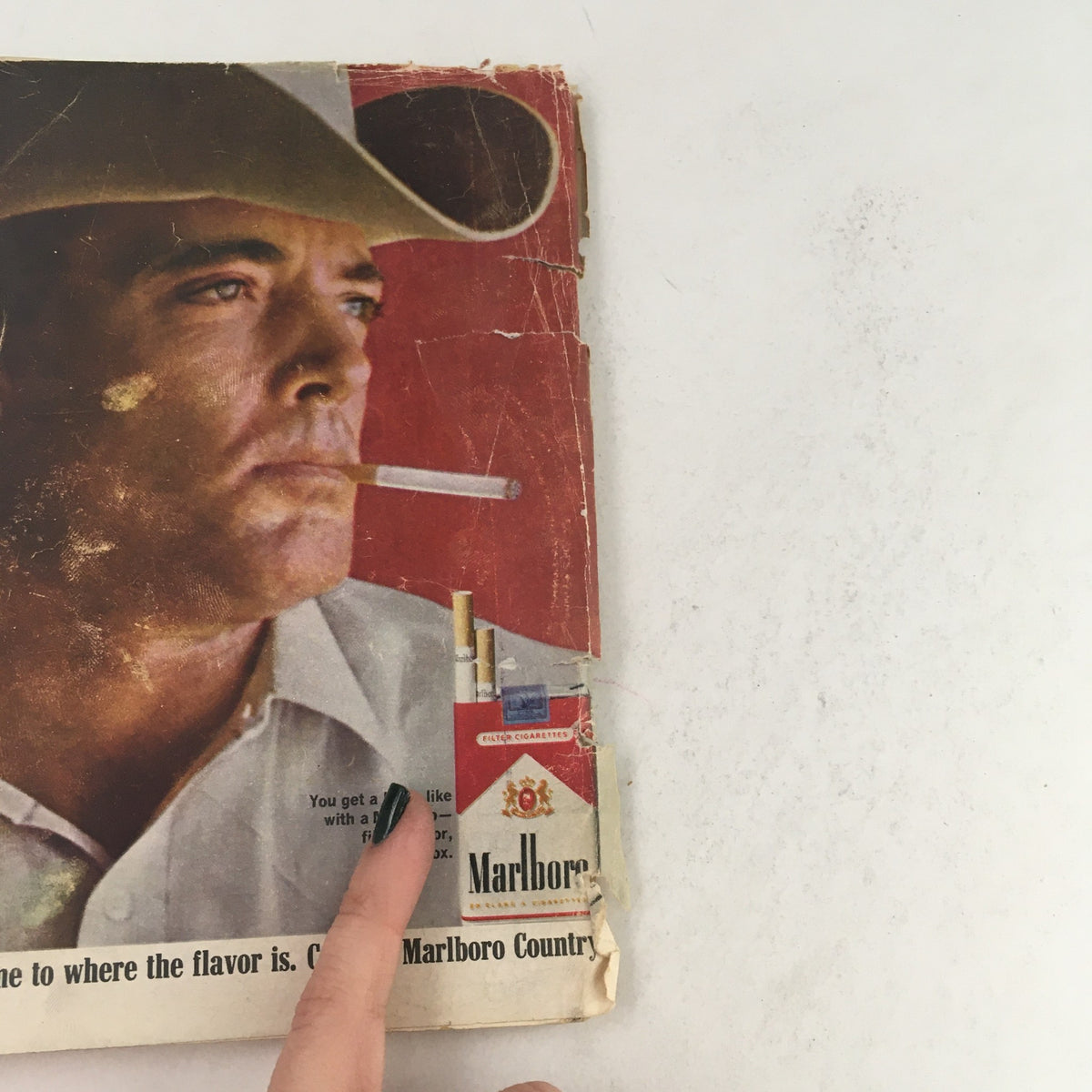 Back cover of TV Guide April 8 1967 displaying a Marlboro advertisement with a cowboy.