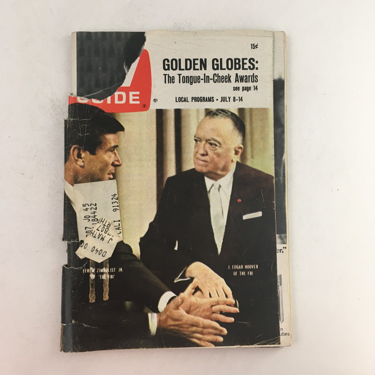 Cover of TV Guide July 8 1967 #745 featuring Efren Zimbalist Jr. and J. Edgar Hoover, showcasing a vintage magazine with a notable design and visible wear.