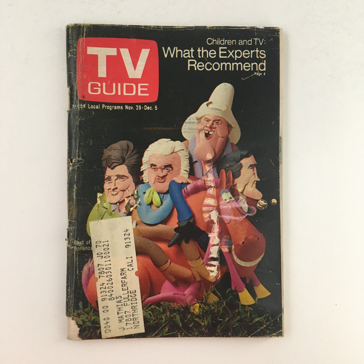 Vintage TV Guide from November 29, 1969, featuring colorful caricatures of iconic television characters, showcasing TV programming recommendations for children. This magazine highlights classic television nostalgia.